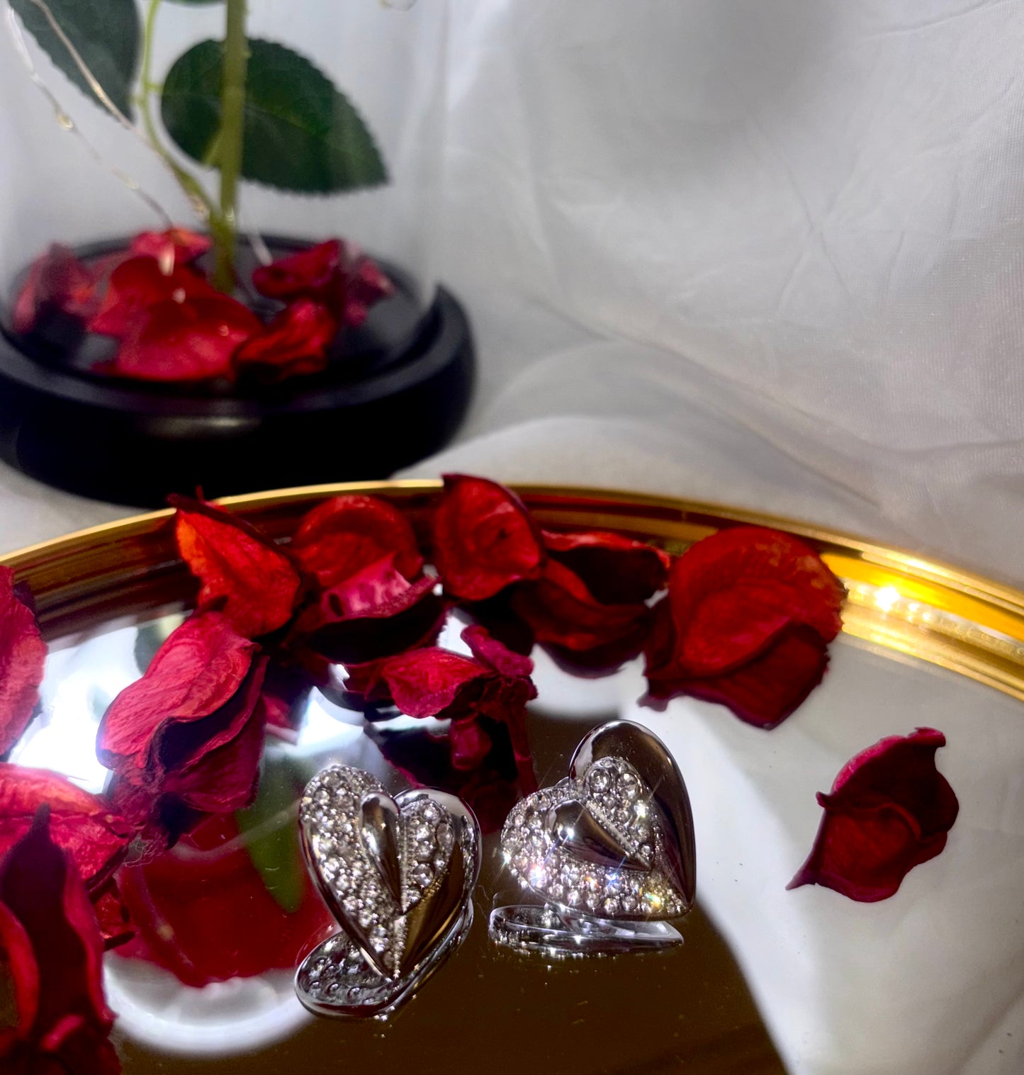 Heart-shaped stainless steel earrings with sparkling zircon stones, perfect for any occasion.