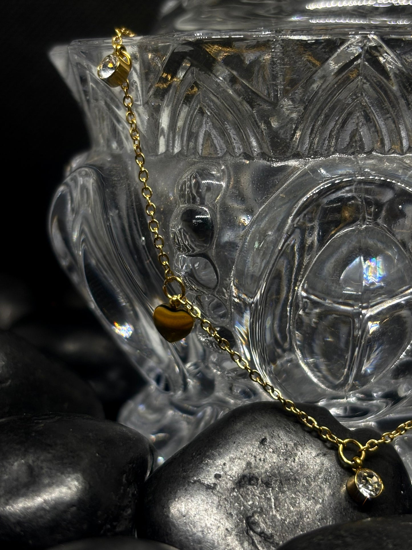 Crafted using top-grade materials, this stainless steel necklace features a charming tassel and intricate zircon heart pendant.