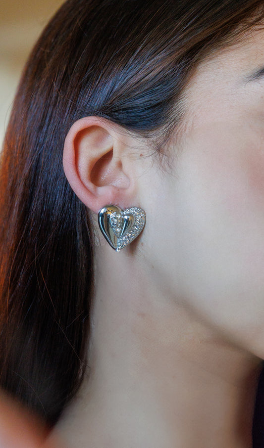 Heart-shaped stainless steel earrings with sparkling zircon stones, perfect for any occasion.