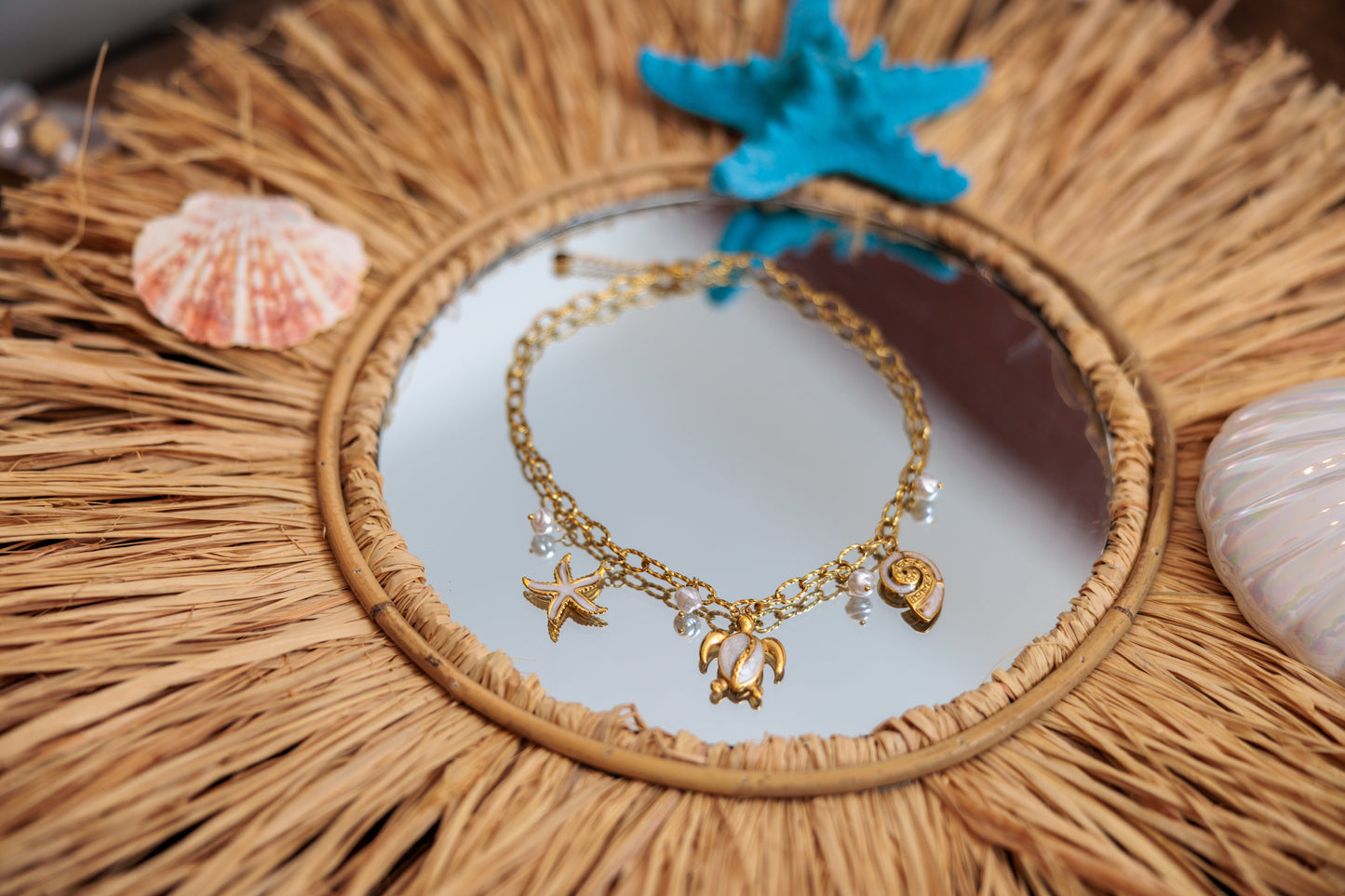 chain necklace with ocean-inspired charms