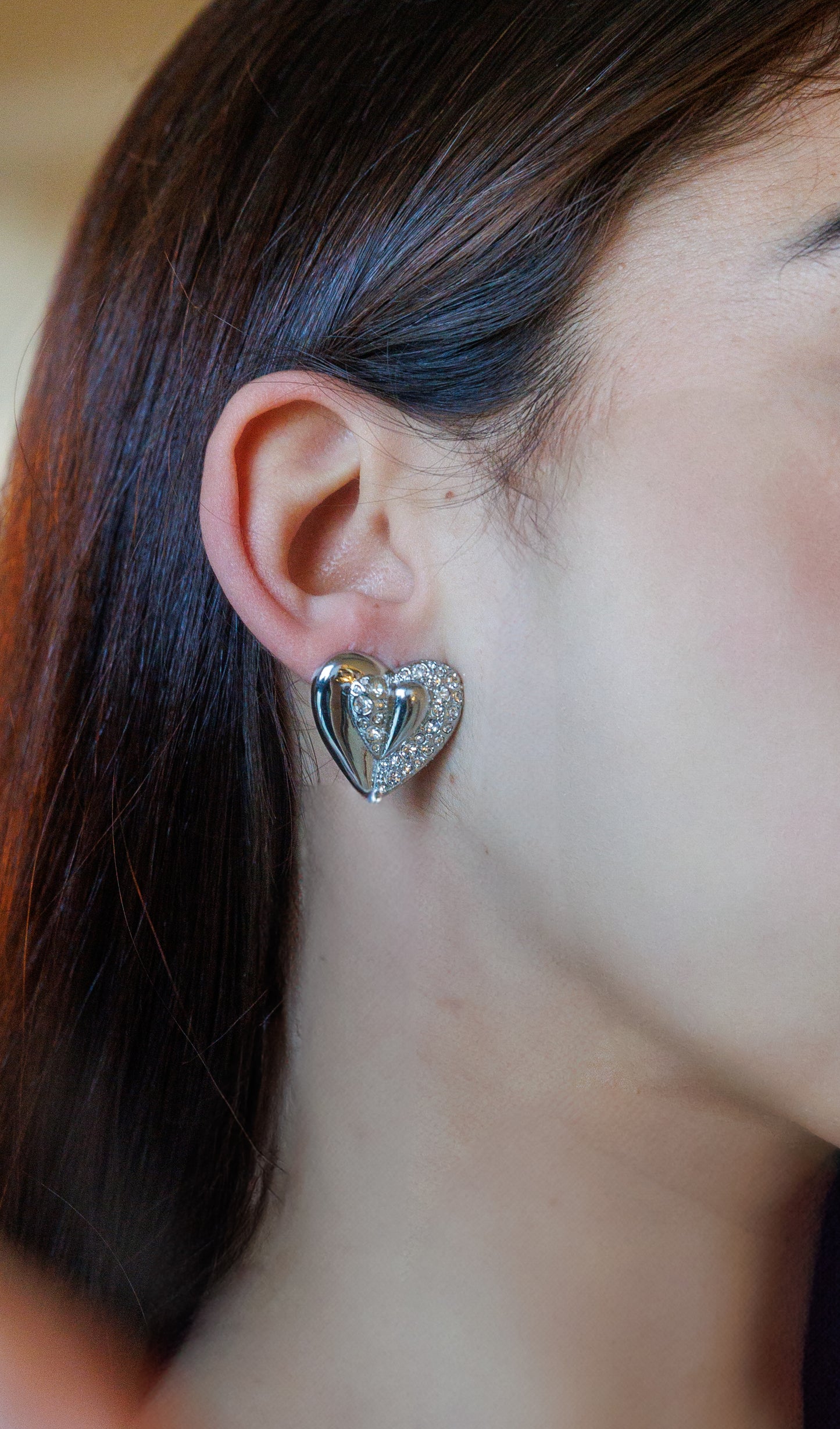 Heart-shaped stainless steel earrings with sparkling zircon stones, perfect for any occasion.