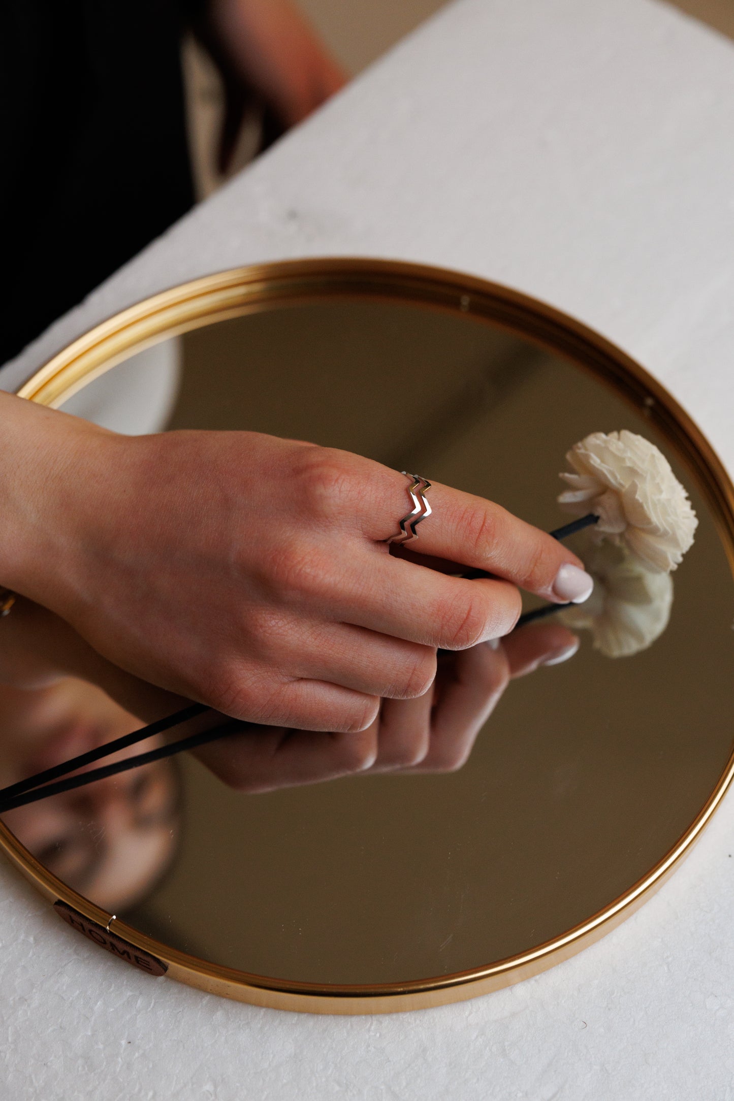 Trendy wave-shaped open ring made of stainless steel, featuring a modern geometric design. Adjustable and stylish, perfect for adding a unique touch to any outfit.